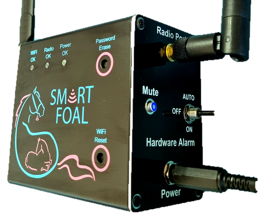 A smart animal deterrent device labeled 'SMART FOAL' with two antennas, shown on a plain white background. The device has a dark gray metallic body with pink and blue text and graphics, and various control buttons and ports.